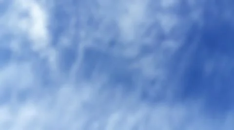 Bokeh white clouds, blue sky, the azure stratosphere, and spindrift. Stock Photos