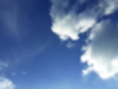 Bokeh white clouds, blue sky, the azure stratosphere, and spindrift. Stock Photos