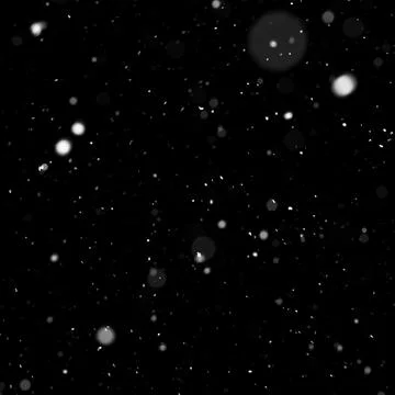Bokeh of white snow on a square shape black background. Falling snowflakes on Foto stock