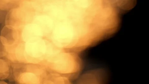 Bokeh of yellow dots sparkling with sunlight in the lake water at sunset Stock Footage 280690796