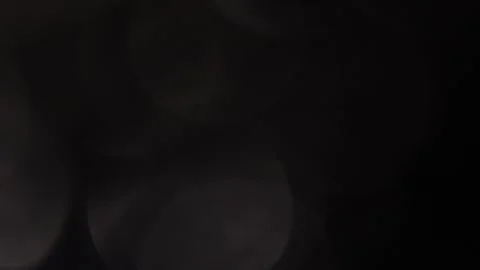 Bokehs up close in the dark Stockbeeldmateriaal 318364134