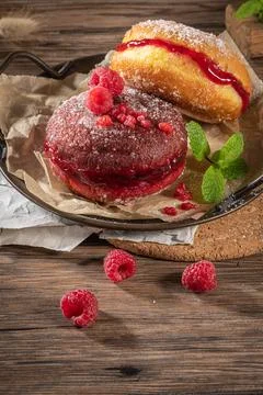 Bolas de Berlim, or "Berlin Balls". Portuguese fried dough with sugar, Filled Stock Photos