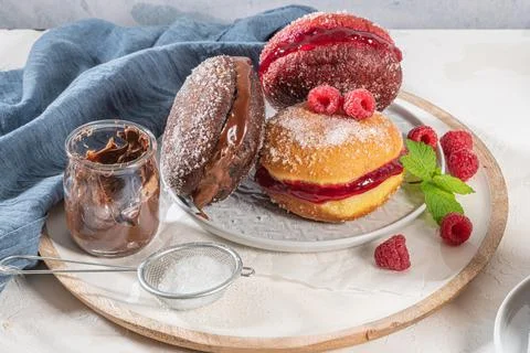 Bolas de Berlim, or Berlin Balls. Portuguese fried dough with sugar, Filled w Stock Photos