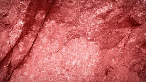 A bold 4K background featuring a natural granite stone texture in soft red .. 写真素材