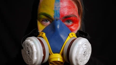 Bold and Creative Expression Showcasing a Colorful Face Paint Design with a Stock Footage 315415541
