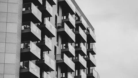 Bold black and white geometry of modern facade with minimal contrast lines.. Stock Photos