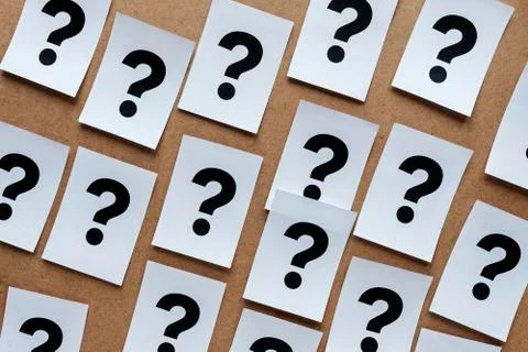 Bold black question marks on paper cards Stock Photos