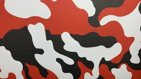 Bold camo pattern in red, black and white creates edgy visual statement Stock Photos