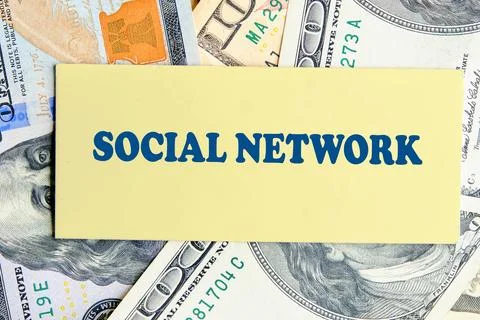 A bold message about social networking is set against a backdrop of U.S. curr Stock Photos