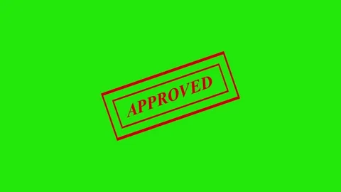 A bold red approved stamp on a solid green background for validation purpos.. Stock Footage 337567659