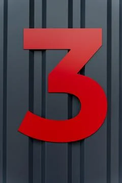 Bold red numeral 3 fixed on ribbed steel faade panel Stock Photos