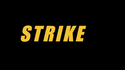 Bold yellow 'STRIKE' text appearing dynamically on a black background, a po.. 库存影片 330280068