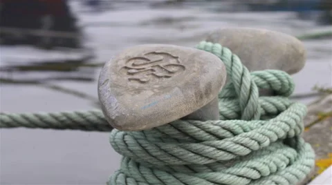 Bollard in the port. Green strings. Stock Footage 68490657