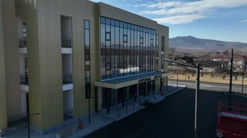 Bolnisi, Georgia - 2022 May 5: Aerial shot of a contemporary school facility Video stock 331133993