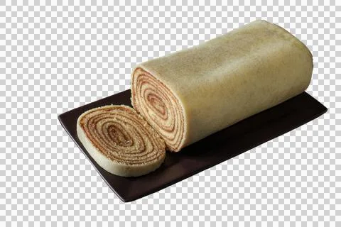 Bolo de rolo slice on a brown plate side view (PNG). Stock Photos