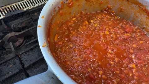Bolognese Meat Sauce Bubbles in a Pot, Homemade Food in a Japanese Izakaya Stock Footage 344775990