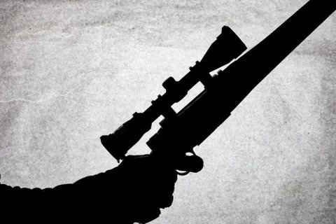 Bolt action carbine with an scope in the hand of a man. Long-range shotgun, c Stock Photos