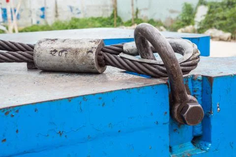 Bolt anchor shackle and wire rope sling Stock Photos