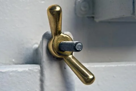 Bolt and wing nut Stock Photos