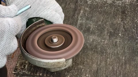 Bolt grinding on the angle grinder machine disk by hand. Burning metal sparks Vídeo Stock 243664639
