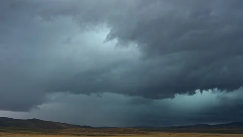 Bolt of lightning strikes the ground during summer monsoon storm in Utah Stock Footage 249678347
