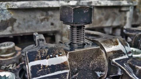 Bolt with a nut on the engine Stock Photos