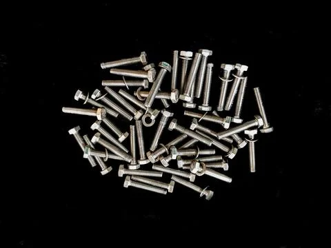 A bolt is used to hold two materials together by screwing together. Foto stock