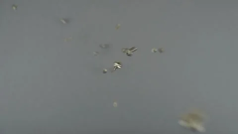 The bolts from above fall down on the gray background Stock Footage 150390002