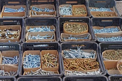 Bolts in boxes Stock Photos