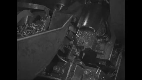 Bolts making machine in process inside the automobile factory - 1939 Stock Footage 103597491