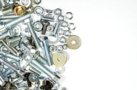 Bolts, nuts and screws. Pattern of nuts and bolts. There is a place for your  Stock Photos