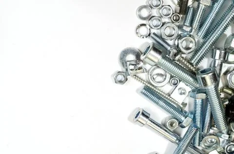 Bolts, nuts and screws. Pattern of nuts and bolts. There is a place for your  Stock Photos