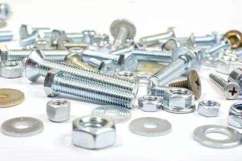 Bolts, nuts and screws. Pattern of nuts and bolts. There is a place for your  Stock Photos