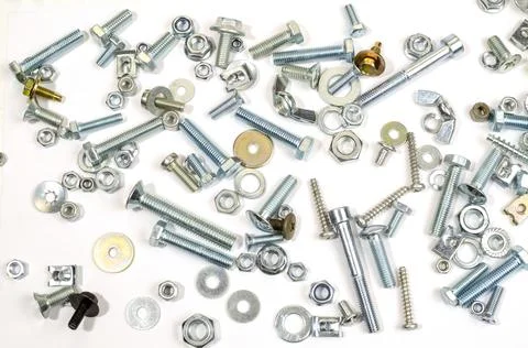 Bolts, nuts and screws. Pattern of nuts and bolts. There is a place for your  Stock Photos