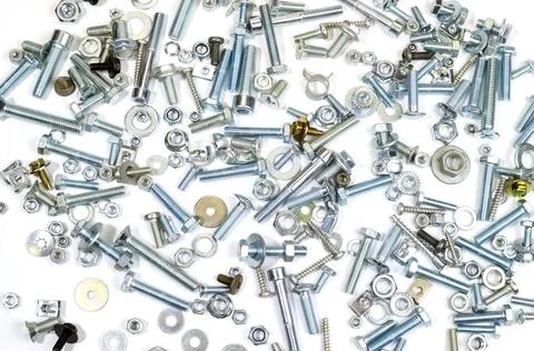 Bolts, nuts and screws. Pattern of nuts and bolts. There is a place for your  Stock Photos