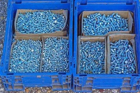 Bolts nuts crates Stock Photos