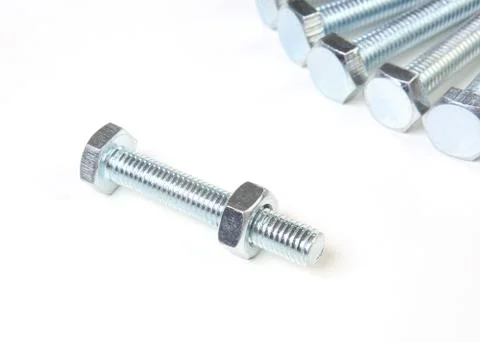 Bolts with nuts isolated Stock Photos