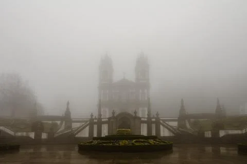 Bom Jesus do Monte Sanctuary in Braga, Portugal, surrounded by dense fog, f.. Stock Photos