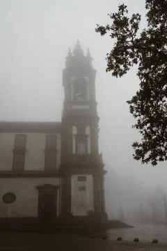 Bom Jesus do Monte Sanctuary in Braga, Portugal, surrounded by dense fog, f.. Stock Photos