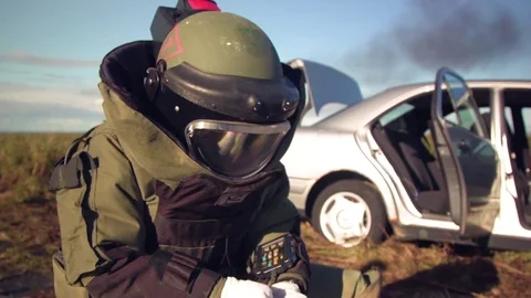 Bomb disposal experts diffuse car bombs in this simulation exercise in Iceland. Stock Footage