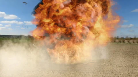 Bomb Explosion on a field Stockbeeldmateriaal 37058708