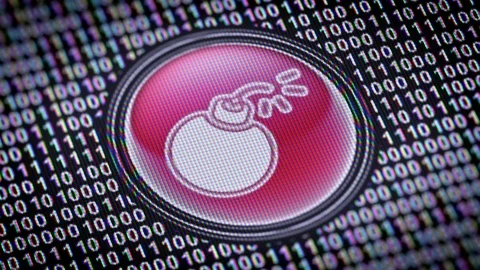 Bomb icon. Binary code ( array of bits ) in the screen. Looping footage 動画素材 110754389