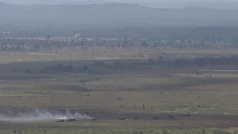 Bomb landing causing explosion and black dust cloud Stock Footage 84722601