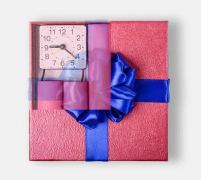 Bomb sticks of dynamite, in a gift box with a blue ribbon with clockwork, ter Stock Photos