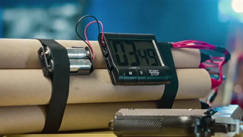 Bomb with a timer with a close rotation. Terrorism and dangerous concept. Video stock 100012027