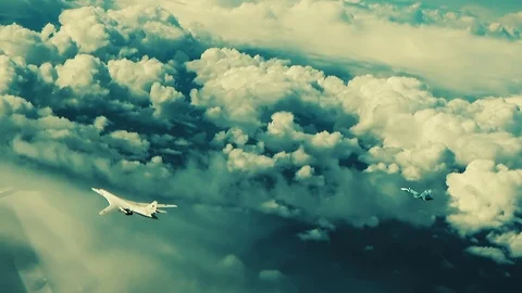 Bomber and fighter in the sky Stock Footage 123075983