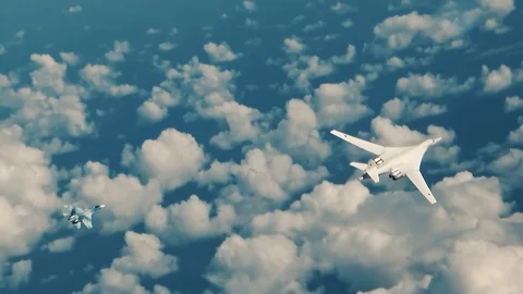 Bomber and fighter in a u-turn Stock Footage 123050802