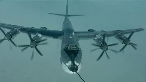 Bomber moves away from the cone Stock Footage 71503966