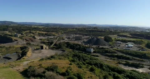 Bombo Quarry open pit basalt mine in Kiama of Australia – aerial 4k. Stock Footage 158187469