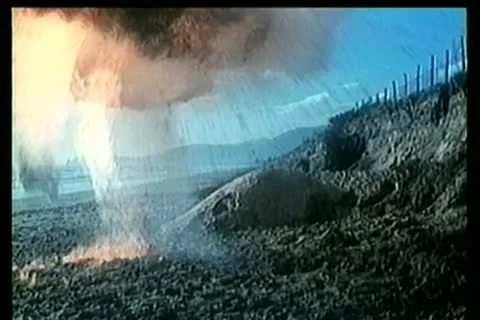 Bombs exploding on beach during gun battle 스톡 동영상 11345953